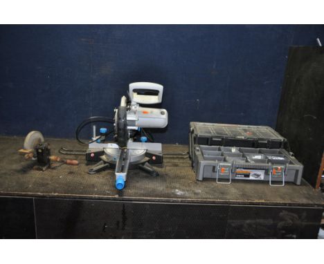 A MACALLISTER SLIDING COMPOUND MITRE SAW, a toolbox containing musical connectors, an Everise rotary tool and a vintage sharp