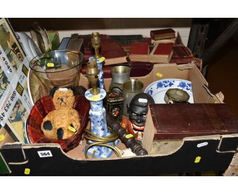 TWO BOXES OF BOOKS AND SUNDRIES, to include two blue and white floral porcelain lamp stands with brass detail (not tested), v