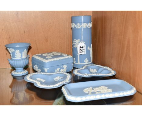 A GROUP OF PALE BLUE WEDGWOOD JASPERWARE ORNAMENTS comprising a square lidded trinket box, two clover-shaped trinket dishes, 