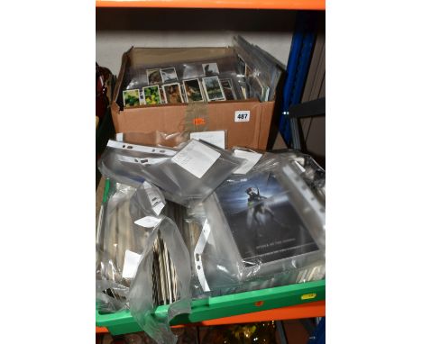 TWO BOXES OF POSTCARDS &amp; CIGARETTE CARDS each containing over a thousand examples, the postcards are mainly mid-20th cent