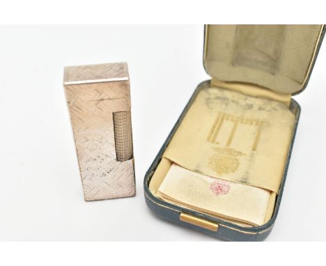 A BOXED 'DUNHILL' LIGHTER, textured pattern, signed to the base 'Dunhill' with fitted case (condition report: striker is stif