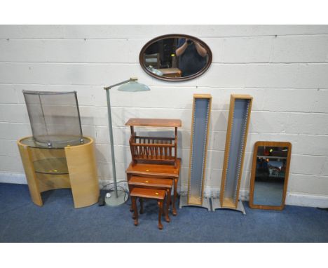 A SELECTION OF OCCASIONAL FURNITURE, to include an oval two tier table, with glass shelves, a fire guard, a standard lamp, a 