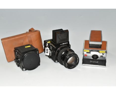 TWO VINTAGE CAMERAS, comprising a Polaroid SX-70 land camera with original case, and a  Zenza Bronica ETRS camera (2) (Condit