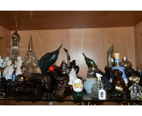 A COLLECTION OF AVON COSMETICS AND SIMILAR BOTTLES, approximately forty bottles, in forms to include vehicles, dogs, swordfis