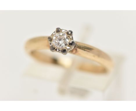 A 9CT GOLD SINGLE STONE DIAMOND RING, the brilliant cut diamond in an illusion setting to the plain yellow gold band, 9ct hal