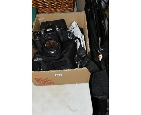 A NIKON D300 DIGITAL CAMERA, with case and user's manual, a Nikon SB-400 speedlight with instruction manual, a Sigma zoom len