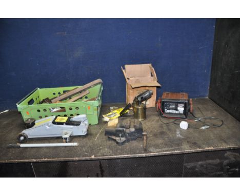 A TRAY CONTAINING TOOLS including a Wooden 186b/1 vice, a Master Craft trolley jack,  a paraffin blowlamp, hammers, an untest
