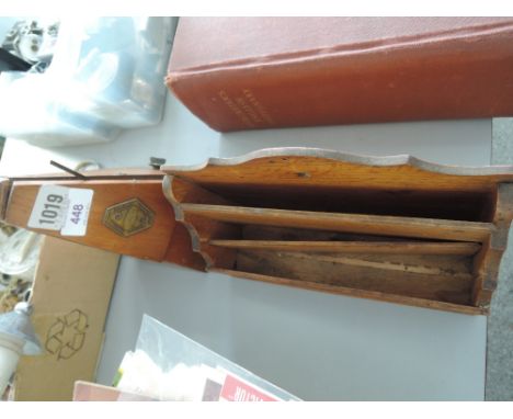 An early 20th century Maelzel Metronome and a similar oak stationary rack