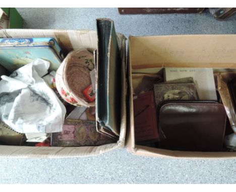 Two boxes of miscellaneous including photo portrait albums, plastic novelty ties, crumb tray etc