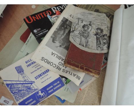 A selection of ephemora, including football programmes, sketch, autograph books etc 