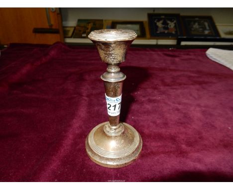 A Silver candlestick, Birmingham hallmark rubbed, possibly AJP/Cold, a/f., 4 3/4" tall.  