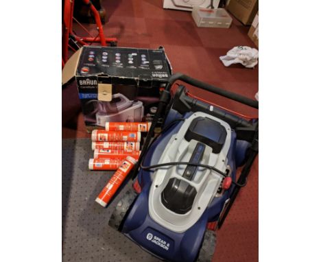 A Spear &amp; Jackson lawnmower, together with a Braun CareStyle 3 steam iron and assorted tubes of Total grease 