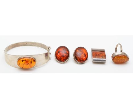 A silver set bangle, pair of earrings, pendant and ring, 53g. 