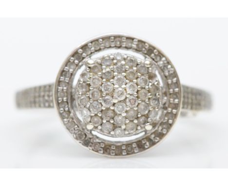 A white gold brilliant and single cut diamond cluster ring, tests 9ct gold, M 1/2, 2.6gm 