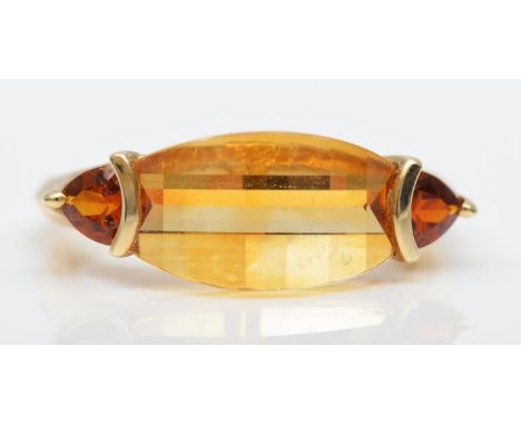 A 9ct gold two colour citrine dress ring, R, 2.9gm 