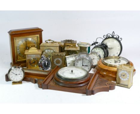 A collection of mid 20th century and later mantel clocks, carriage clocks and barometers, having manual and quartz movements.