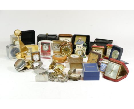 A collection of mid 20th century and later novelty miniature and bedside travel clocks, having manual and quartz movements. (