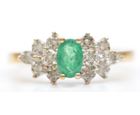 A 9ct gold emerald and diamond dress ring, O, 3gm 