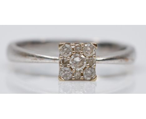 A 9ct white gold and brilliant cut diamond dress ring, stated weight 0.15ct, H, 1.9gm 