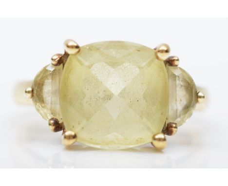 A 9ct gold three stone citrine ring, L, 3.2gm 