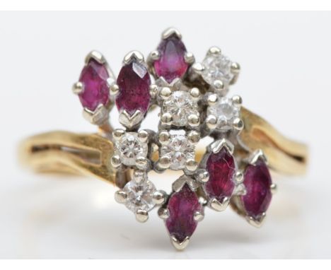 A 14K gold brilliant cut diamond and ruby dress ring, l, 3.6gm 