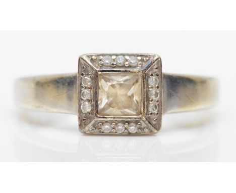 A 9ct white gold , clear gemstone and diamond square cluster ring, J, 2.8gm 