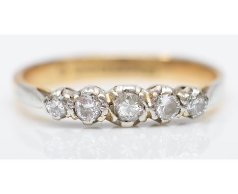 A vintage 9ct gold and brilliant cut diamond five stone ring, O 1/2, 2.1gm 