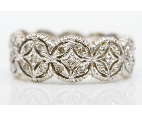 A 9ct white gold openwork band ring, M, 3.8gm 