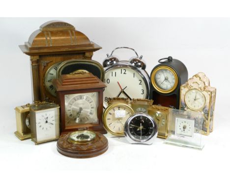 A collection of mid 20th century and later mantel clocks, carriage clocks and barometers, having manual and quartz movements.