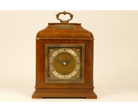 A mahogany cased Elliott mantel clock, having brass dial with silvered chapter ring bearing Roman numerals, having an 8 day m