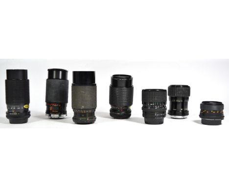 Seven manual camera lens, to include a Tokina 80mm-200mm f4.5, a Sigma 35mm-70mm f2.8-f4 l, a Sigma 28mm-70mm f3.5-f4.5, a Be