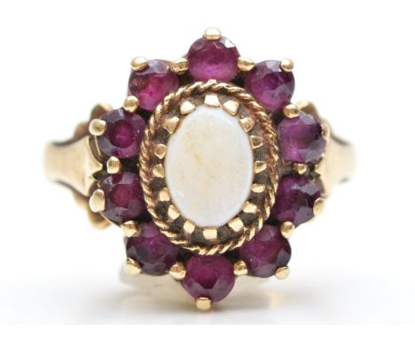 A 9ct gold opal and garnet cluster ring, K, 3.2gm 