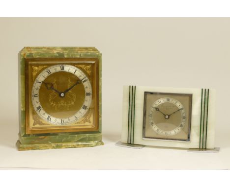 A 1960s Art Deco style Elliott 8 day mantel clock, the veined marble case with chrome bezel and stand, 13cm tall, together wi