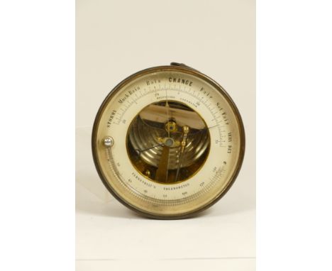 A late 19th century brass wall hanging holosteric barometer and fahrenheit's thermometer. 13cm diameter. 