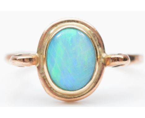 A vintage rose gold and probably opal doublet ring, tests 9ct gold, M, 2.5gm Good condition showing no issues