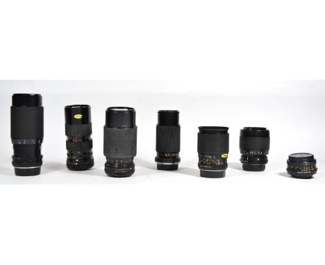 Seven manual camera lens, to include a Tokina 70mm-210mm f4.5, a Sunagor 28mm-100mm f3.5-f5.5, a Sigma 70mm-210mm f4-f5.6, a 