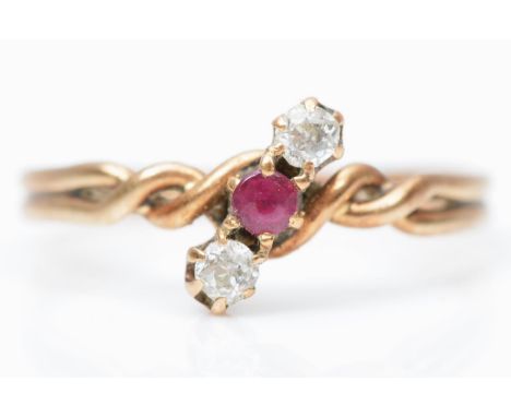 A Victorian rose gold ruby and old cut diamond three stone ring, L, 1.6gm 