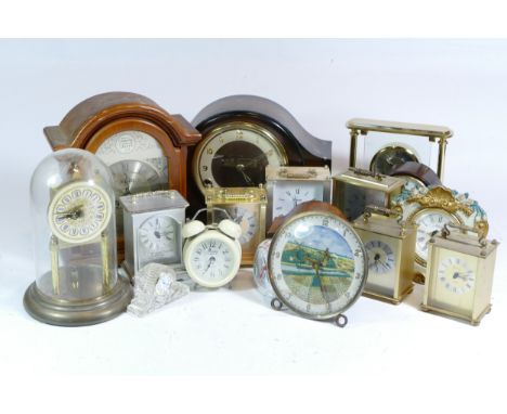 A collection of mid 20th century and later mantel clocks and clock parts, having manual wind and quartz movements, to include