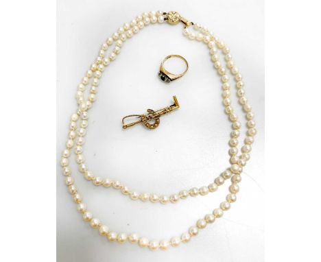 A cultured freshwater pearl necklace with a clasp stamped '375', together with a hallmarked 9ct gold three stone sapphire and