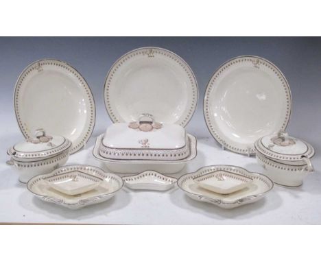 A Wedgwood creamware part dinner service, circa 1800-1810, with foliate borders in sepia and lion heraldic crest, comprising 