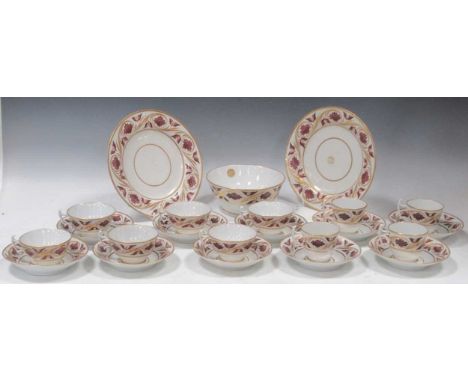 A Coalport John Rosepart tea and coffee service, circa 1810, the borders decorated in sepia with stylised quatreform motifs a