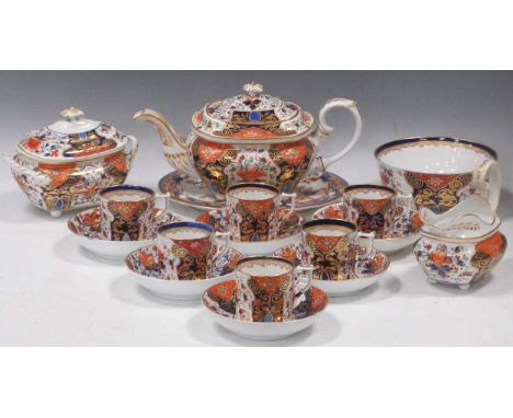 A Derby tea and coffee service circa, 1825-30, decorated in the Old Witches pattern in red, green, blue and gilt, comprising 