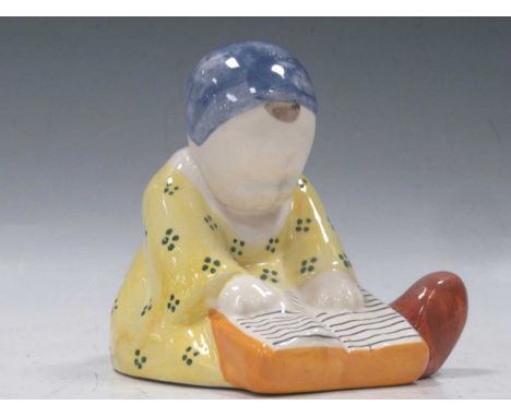 A Quimper figure of a young girl reading by Berthe Savigny11.5cm highA few minor firing marks to the top of the head and shou