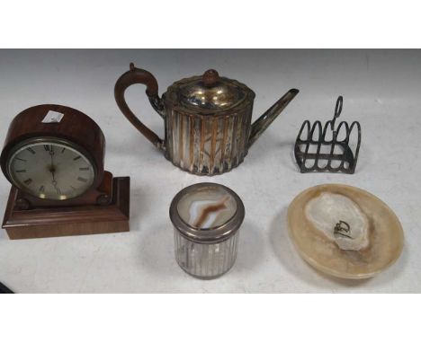 A small 20th century mantel clock on a stepped and overscrolled mahogany base, Brevette. Together with an agate mounted silve