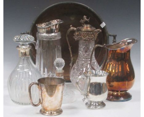 A large two handled copper planter, together with water jug with silver plated cuff, 2 no silver cuffed decanters, 2 pewter t