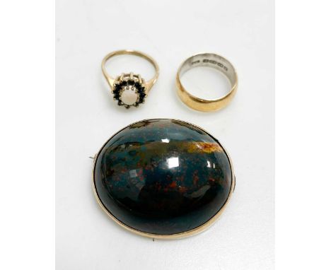 A hardstone brooch tested as 9ct gold and a hallmarked 9ct gold ring, gross weight 25.7g, together with a hallmarked 22ct gol