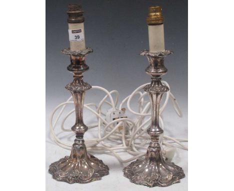 A pair of silver plated candlestick lamps, 32cm high including fitting (2)