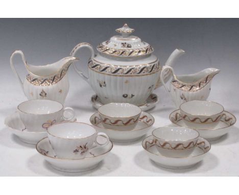 A Chamberlain Worcester fluted teapot, cover and stand and a two cream jugs, circa 1795, decorated with borders of feathers a