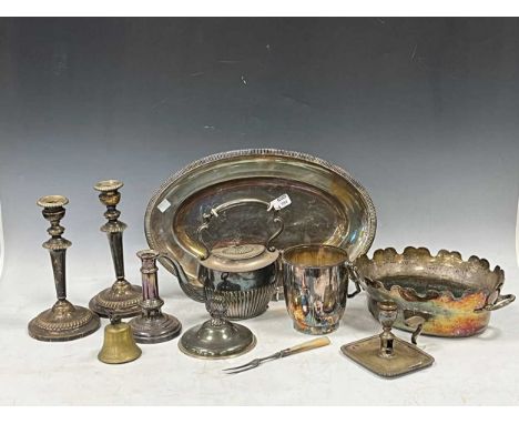 A quantity of silver plated items to include a pair of candlesticks, tea pot, chamber stick, oval tray etc