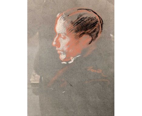 A portrait study of a man in profile, red, black and white chalk, indistinctly signed, 31 x 24cm